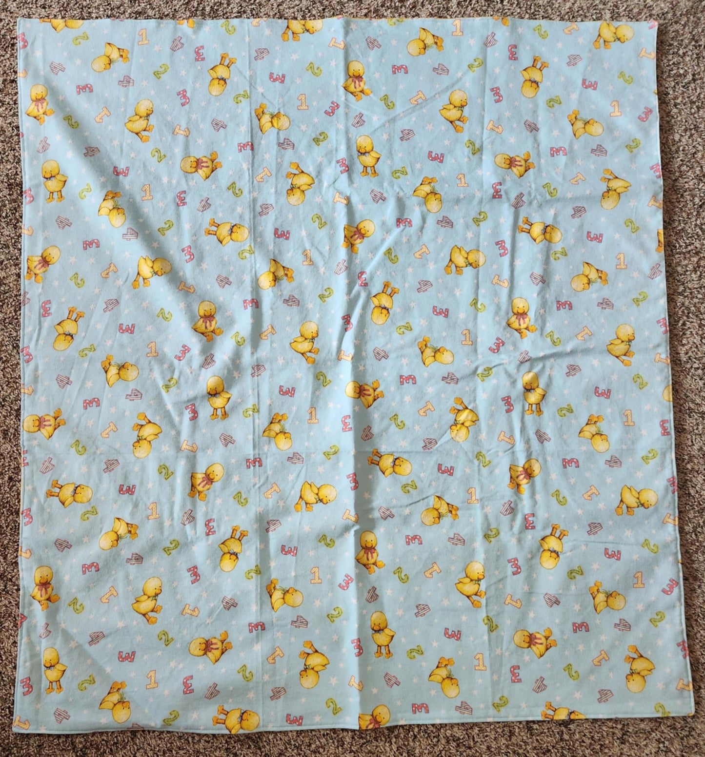 Square Receiving Blanket with Baby ducks and numbers pattern with blue background Fleece.