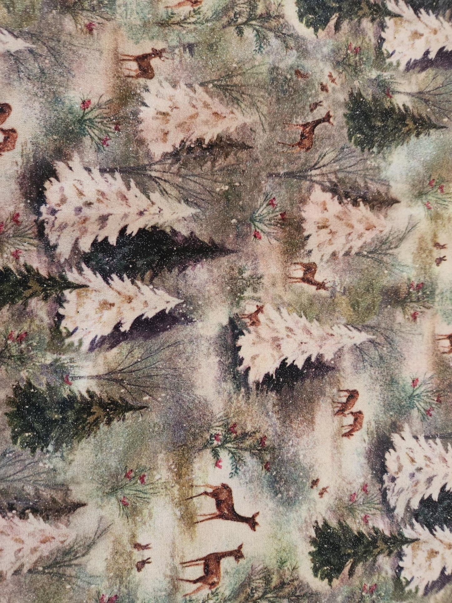 Sparkly fabric with trees flowers and deer print