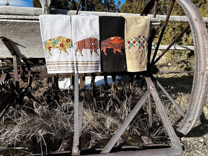 Four Hand Towels, two white , one black and one tan. Each bison is a western pattern and different color