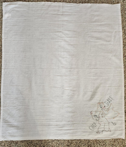 White Square Dish Towel With embroidery in the bottom left corner of Chipmunks Chip and dale arms entwined. The words " Chip And Dale embroidered in black thread on both sides  