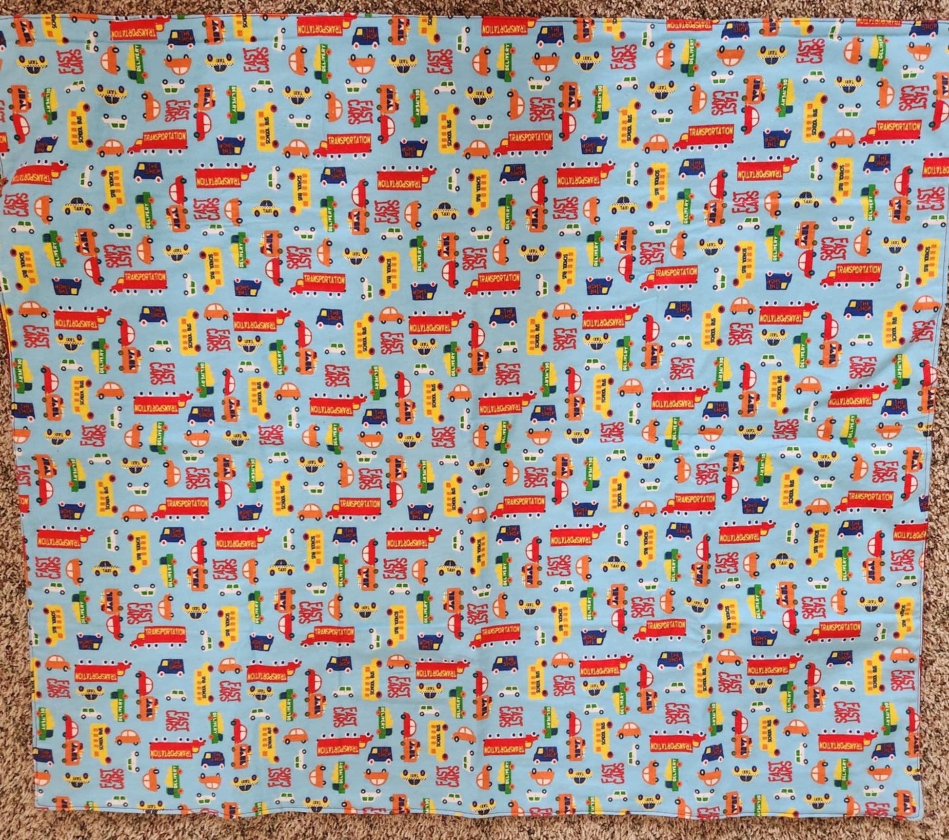 Square Receiving Blanket with Multi Vehicles with a blue background Fleece. 